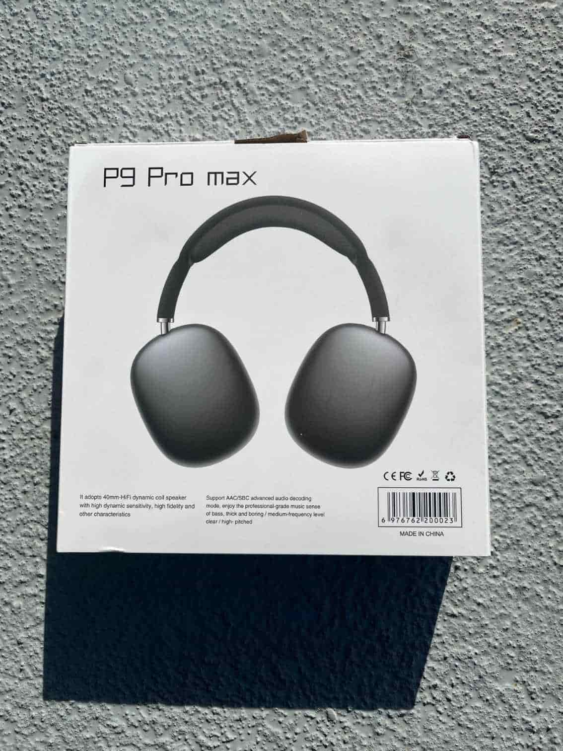 Back view of black P9 Pro Max headphones box with features.