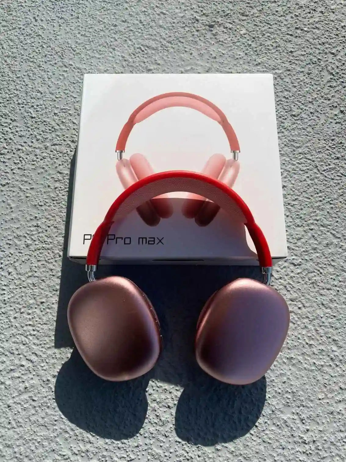 P9 Pro Max Pink Headphones front view with packaging.