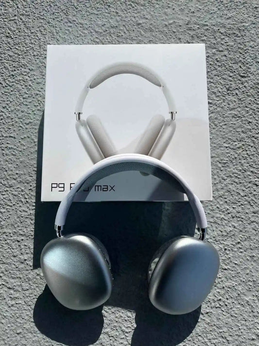 Silver Pro Max Bluetooth headphones with comfortable over-ear design.