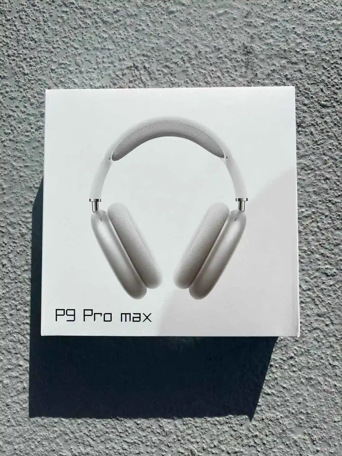 Silver P9 Pro Max headphones with noise cancellation and Bluetooth 5.0 technology.