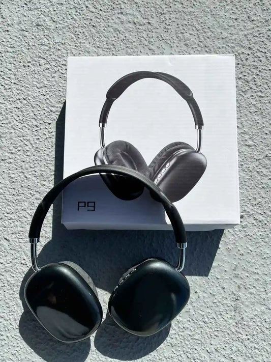 Stylish p9 wireless headphones, in black colour, on the box.