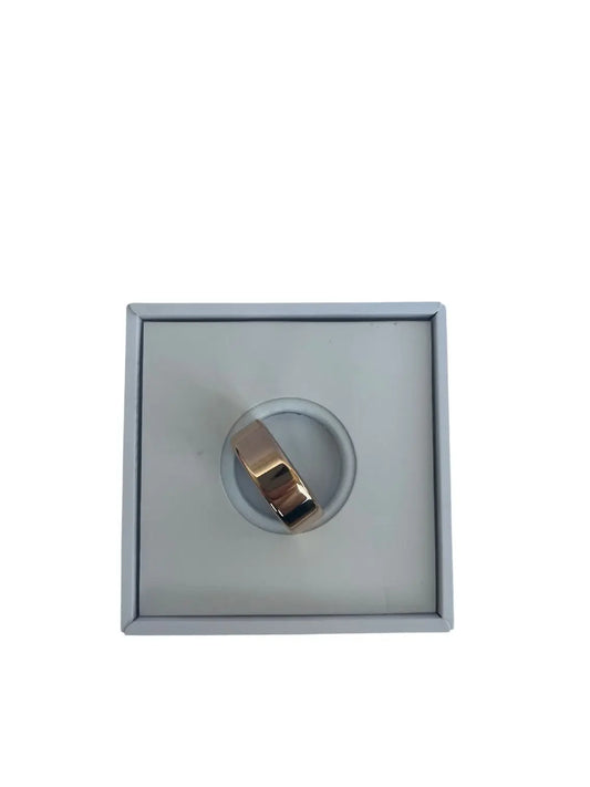 Gold ring in a box on a white background