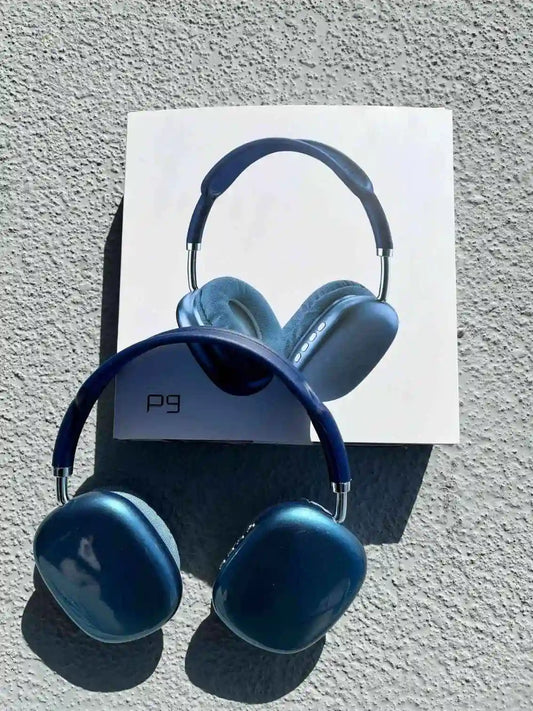 Stylish foldable wireless headphones p9 in blue colour, on the box.