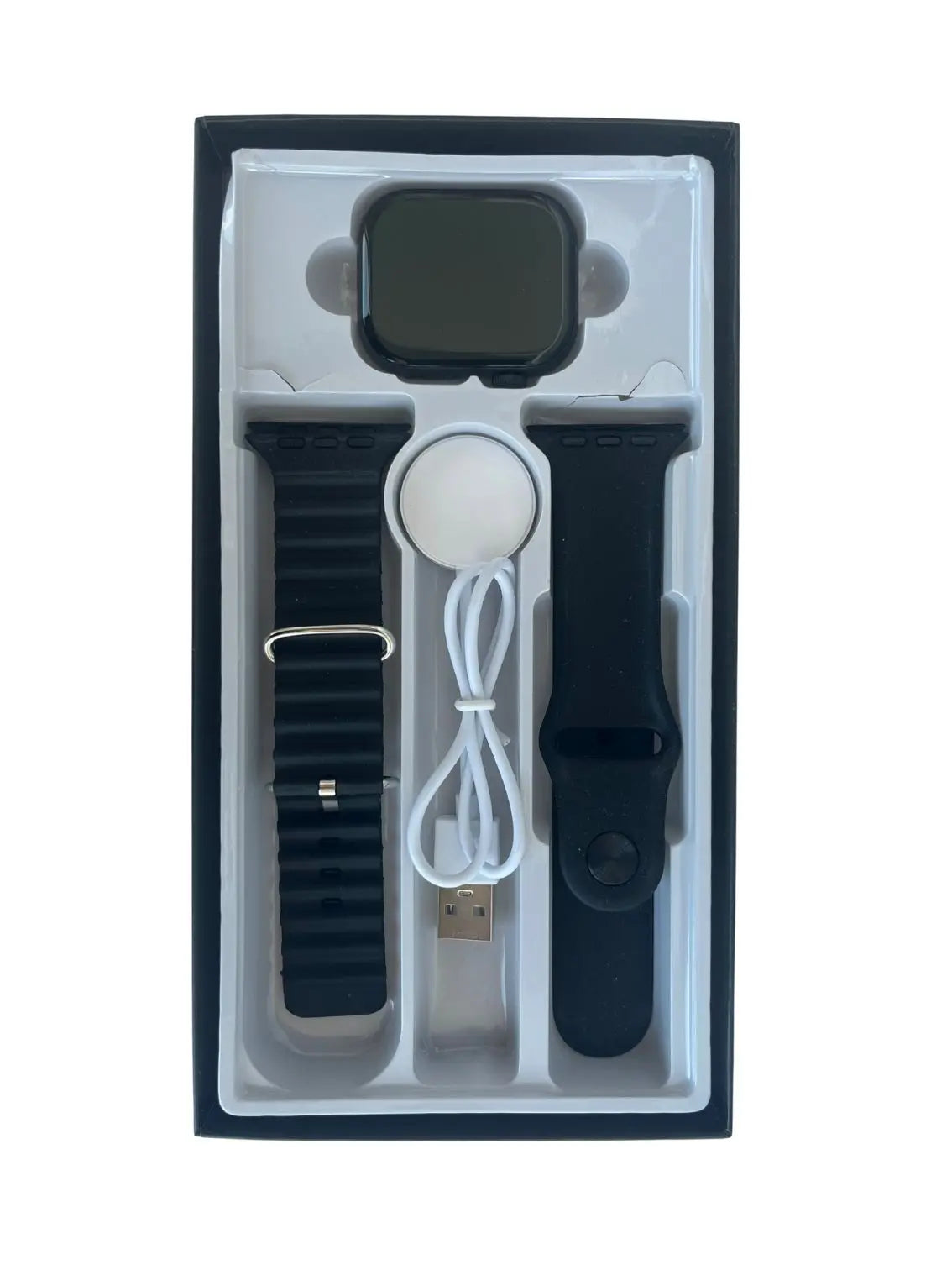 Smartwatch with black band and accessories in a box on a white background.