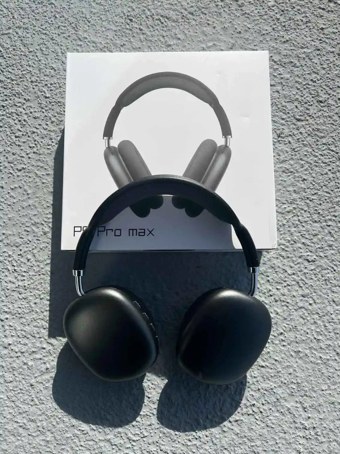 Black P9 Pro Max headphones with soft over-ear design.