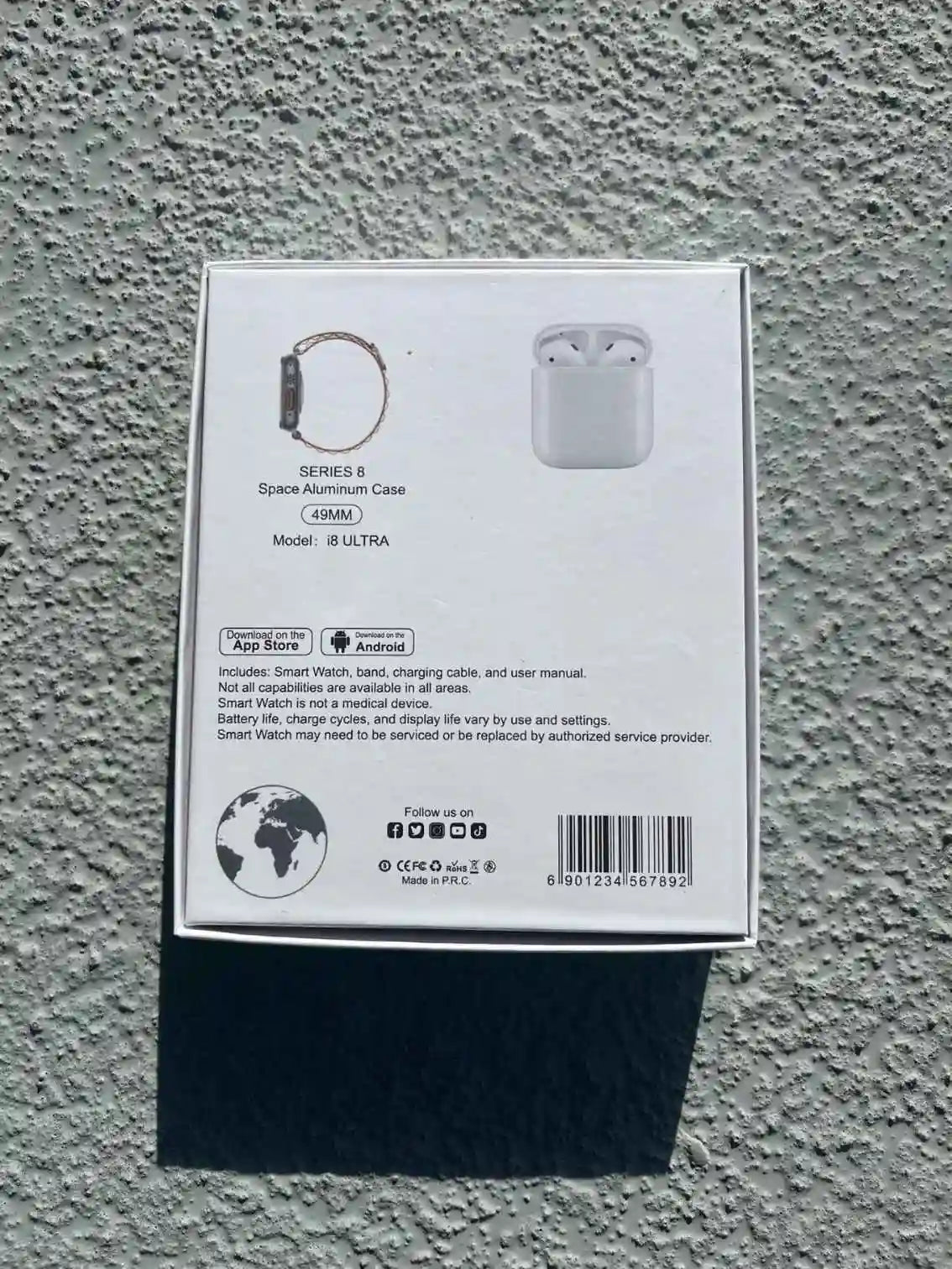 Back view of i8 Ultra smartwatch and earphones set packaging, showing product details and compatibility with Apple and Android devices.