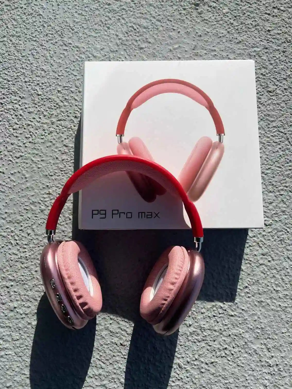 P9 Pro Max Pink Headphones displayed with box.