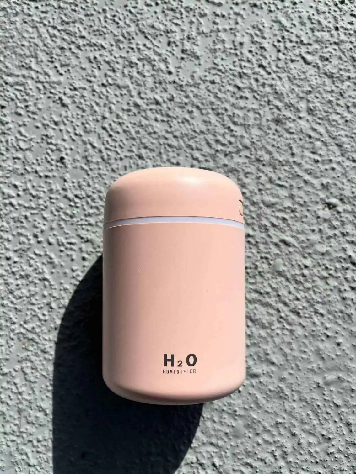 A pink humidifier on the front side.