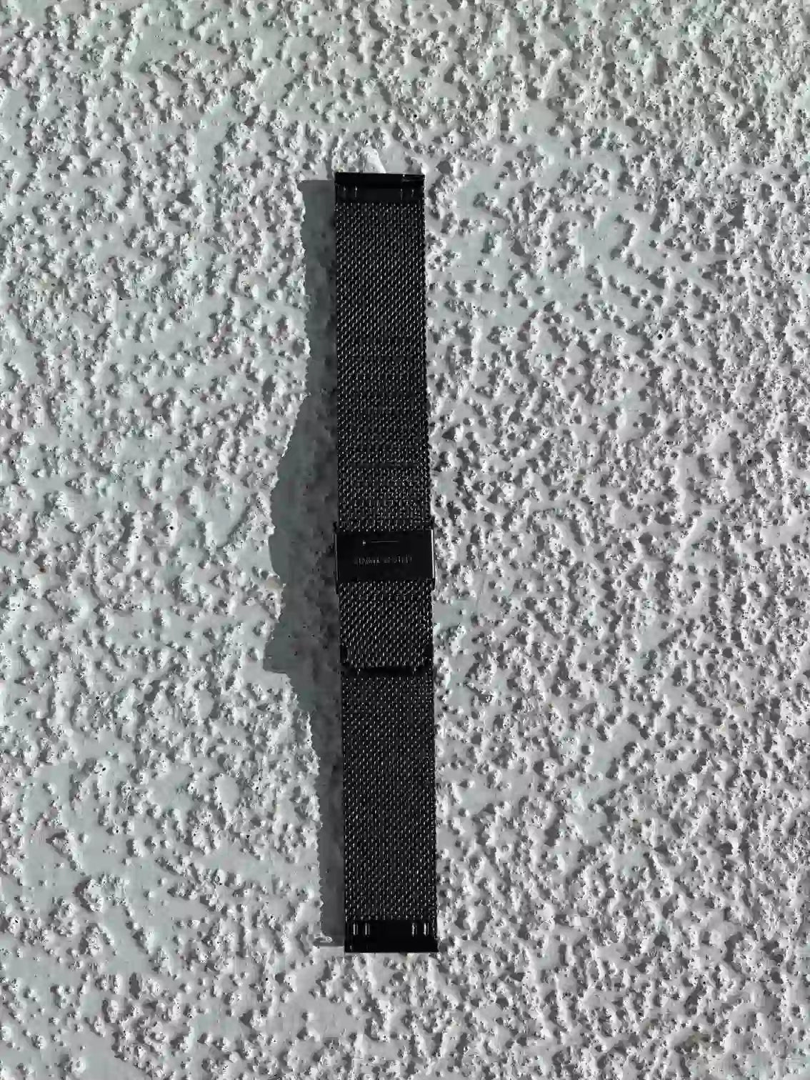 Smartwatch black stainless strip.