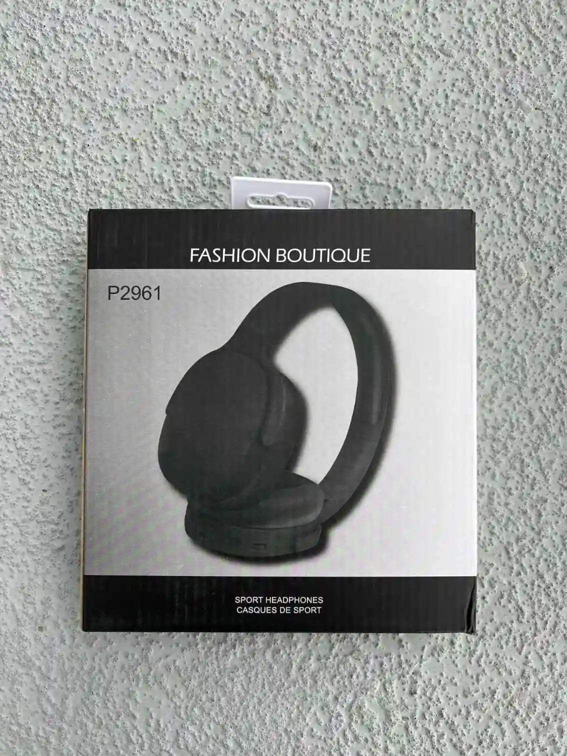 Front view of Fashion Boutique P2961 sport headphones box, highlighting sleek and modern design.