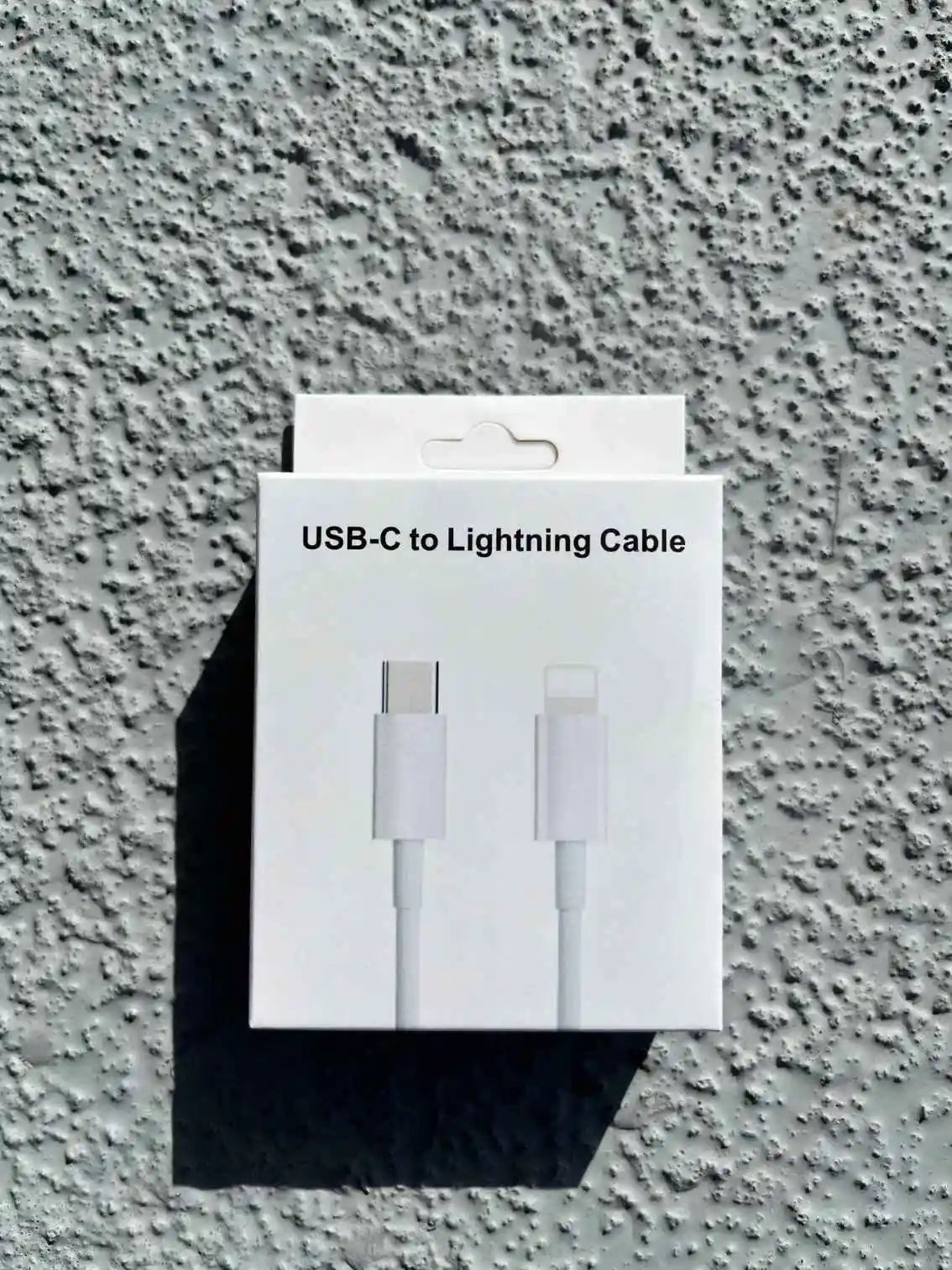 The box with a USB-C to Lightning cable inside.