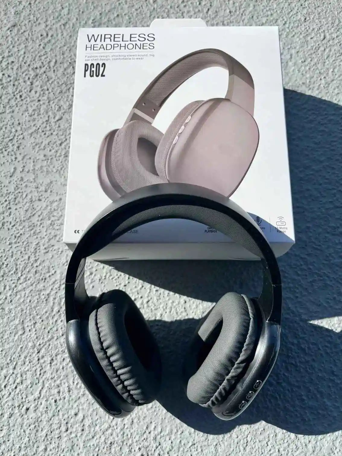 Over-ear PG02 wireless Bluetooth headphones black with a sleek design.